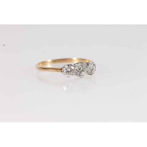 110 - 18ct gold and three stone diamond trilogy ring, the brilliant round cut diamonds on platinum setting... 