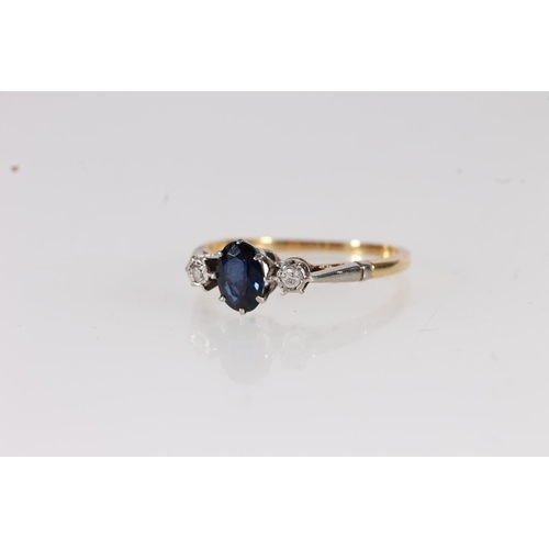 111 - 1930s 18ct gold sapphire and diamond ring, the oval cut sapphire flanked by round cut diamonds, on a... 
