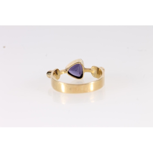 113 - Modernist 18ct gold amethyst and diamond ring, the trilliant cut amethyst on a knife edge mount flan... 