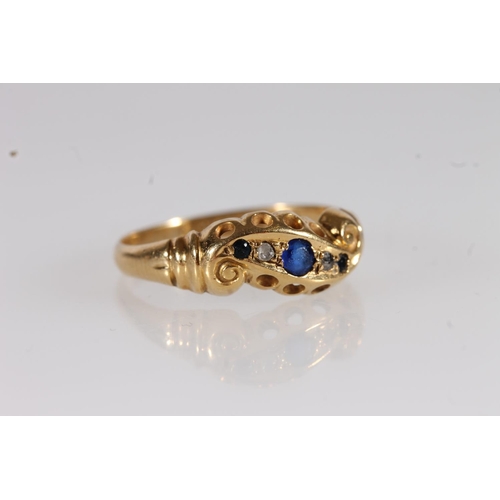 114 - c1920s 18ct gold and sapphire crossover ring, the three sapphires interspersed by diamond chips on s... 