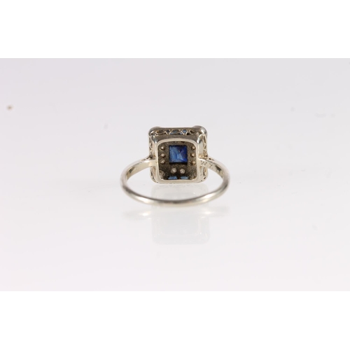 118 - Art Deco 18ct white gold sapphire and diamond ring, the central square cut sapphire flanked by round... 
