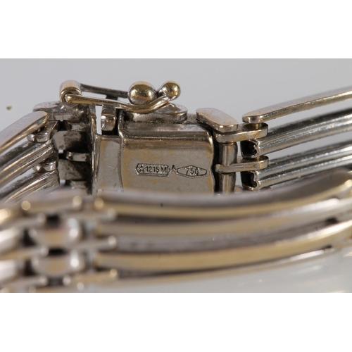 131 - 18ct white gold gate bracelet, the links with gilt wash finish, 21.6g, 20cm long.