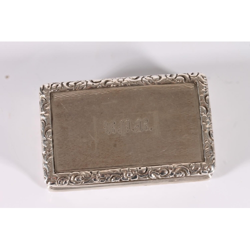 28 - Georgian antique silver snuff box of rectangular form with embossed foliate borders and gilded inter...