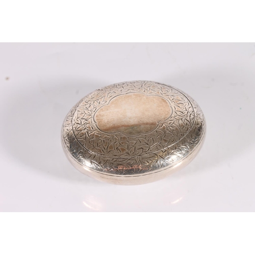 30 - Victorian antique silver squeeze release tobacco box of oval pebble shape with all over incised flor...