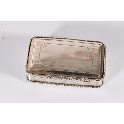 33 - Victorian antique silver snuff box of cushioned rectangular shape with embossed foliate border rims,...