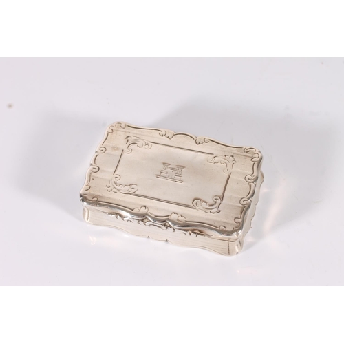 38 - Victorian antique silver snuff box of rectangular shape with serpentine scroll border rim, incised a...