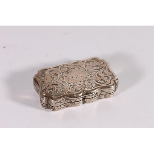 57 - Victorian antique silver vinaigrette of rectangular form with serpentine edge and incised scrolling ...