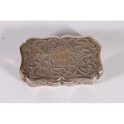 57 - Victorian antique silver vinaigrette of rectangular form with serpentine edge and incised scrolling ...