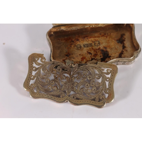 57 - Victorian antique silver vinaigrette of rectangular form with serpentine edge and incised scrolling ... 