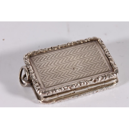 60 - Victorian antique silver vinaigrette of rectangular form with engine turned decoration and relief em...