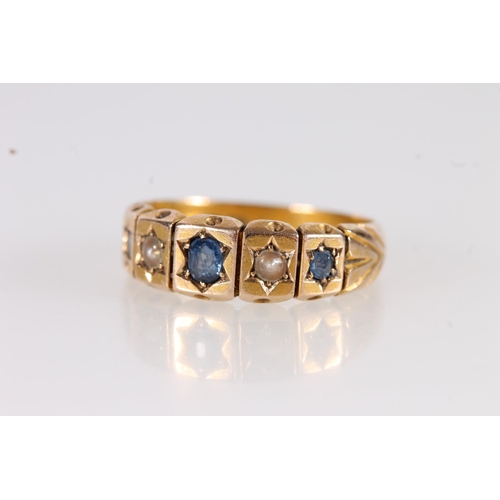 90 - Late Victorian 15ct gold ring set with sapphires and seed pearls in a star cut mount with repeating ... 