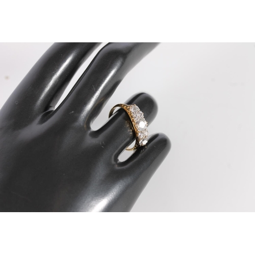 92 - Edwardian 18ct gold and seven diamond ring, the seven round cut graduating stones approx. 0.9 to 1.0... 