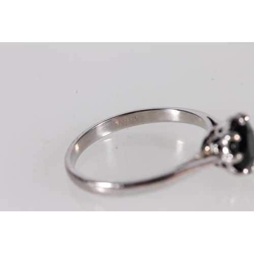94 - 18ct white gold and onyx ring, ring size R/S.