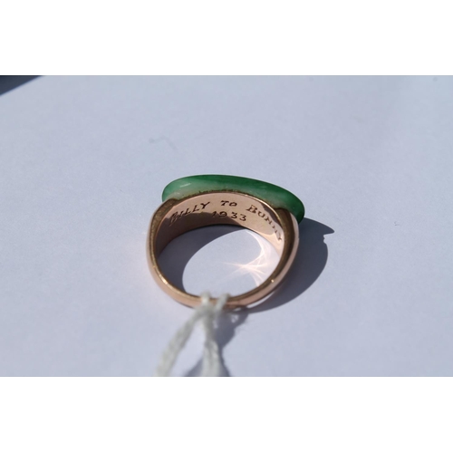 374 - Jadeite ring with curved cabochon, inscribed and dated 1933, probably 14ct gold, size M.