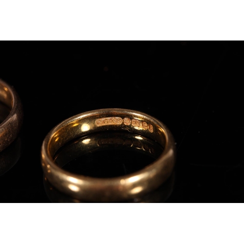 153 - 22ct gold plain wedding band, ring size O, and another, ring size J, 8.0g gross. (2)