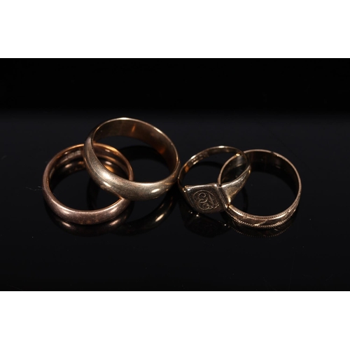 154 - Three 9ct gold wedding bands and a 9ct gold signet ring, 12.9g gross. (4)