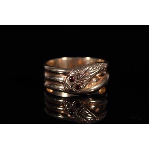 155 - 9ct gold snake ring, the eyes set with garnets, maker CPS Jewellery Company Limited of Vyse Street B... 