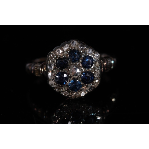 156 - Antique yellow metal diamond and sapphire cluster ring, the stones formed in the shape of a flower h... 