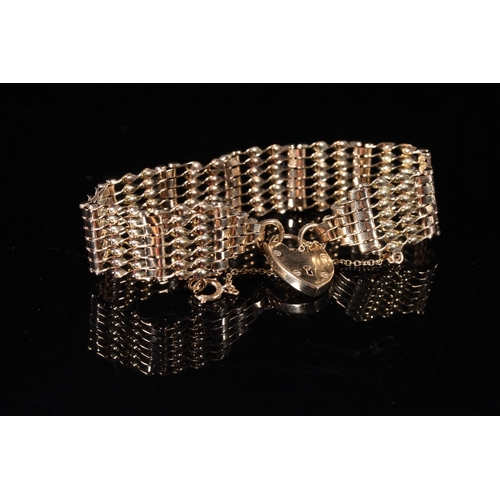 158 - 9ct gold gate link bracelet with heart shaped padlock closure, 20g gross.