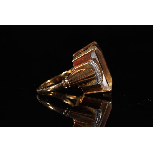 160 - 18ct gold and platinum ring set with large baguette cut Citrine, possibly South African, the stone a... 