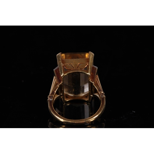 160 - 18ct gold and platinum ring set with large baguette cut Citrine, possibly South African, the stone a... 