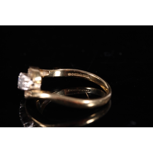 161 - 18ct gold diamond three stone ring in crossover setting, the stones approx. 0.1ct each, size R, 5g.