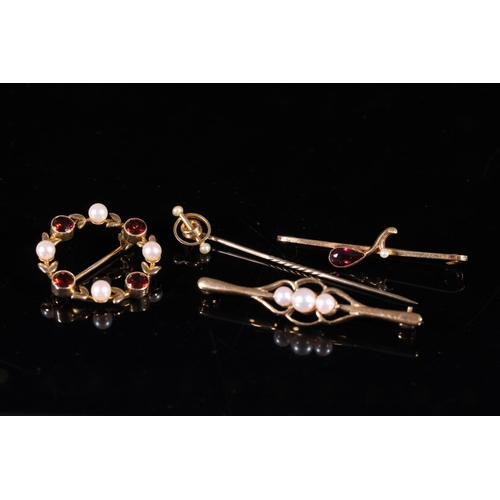 182 - Three Edwardian 9ct gold gem set bar brooches together with a 9ct gold mounted stick pin, gross 9.0g... 