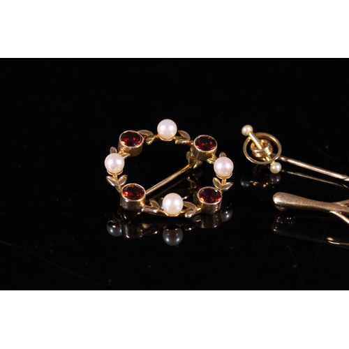 182 - Three Edwardian 9ct gold gem set bar brooches together with a 9ct gold mounted stick pin, gross 9.0g... 