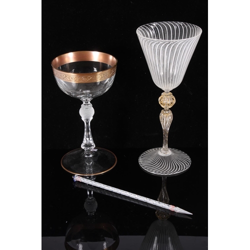 303 - Venetian wine glass, early 20th century, the tapered lattimo threaded bowl over a wrythen aventurine... 