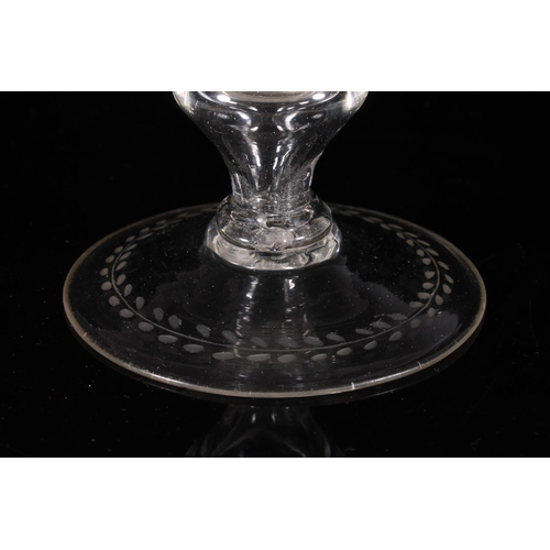 308 - 18th century continental wine glass, the funnel bowl wheel engraved with foliate forms and windowed ... 