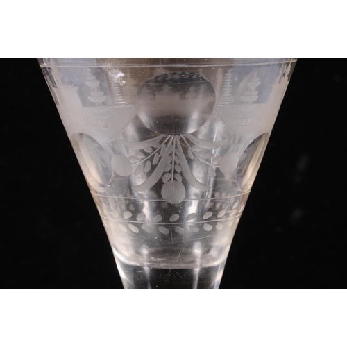 308 - 18th century continental wine glass, the funnel bowl wheel engraved with foliate forms and windowed ... 