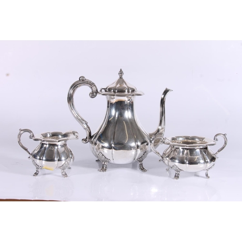 76 - Norwegian .830 standard silver three piece tea set, of typical rococo form on scroll feet, marked to... 