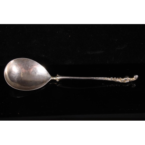 84 - Continental or English provincial silver love spoon, late 17th century, with scrolled mask head term... 
