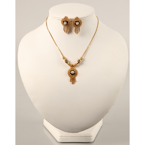 105 - High karat yellow gold necklace and matching earrings set with pearls and blue enamel, gross weight ... 