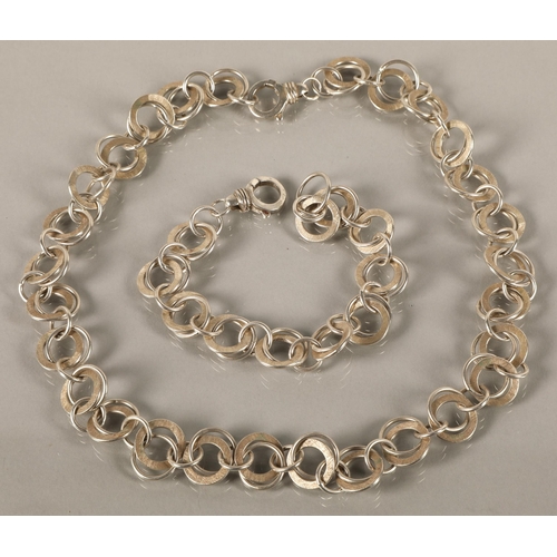 109 - Christine Sadler contemporary silver necklace and matching bracelet, gross weight 71.8g