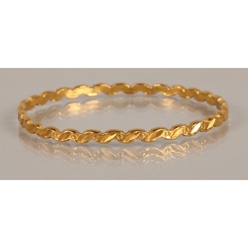 124 - High karat yellow gold bangle, 21.7g