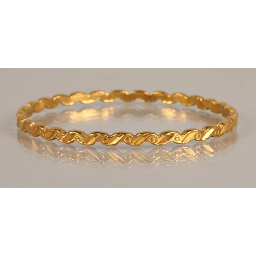 125 - High karat yellow gold bangle, 22.2g