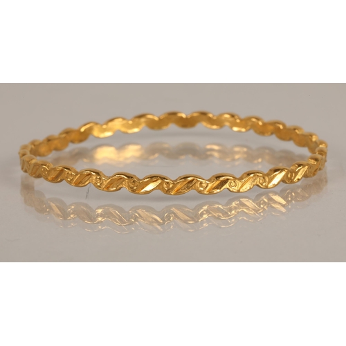 127 - High karat yellow gold bangle, 22.3g