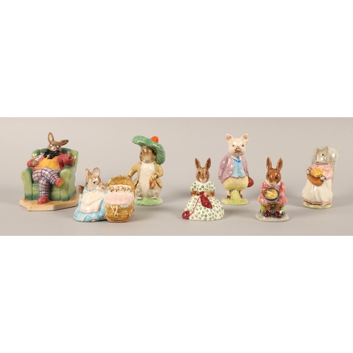 21 - Seven Royal Doulton, Royal Albert & Beswick figurines to include Bunnykins and Beatrix Potter