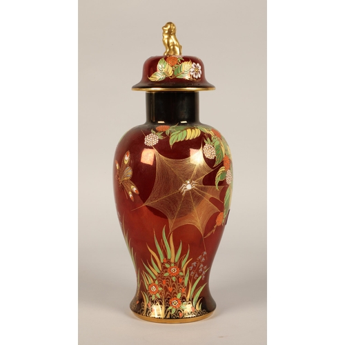 239 - Carlton ware rouge royale baluster vase and cover surmounted with dog of foe.