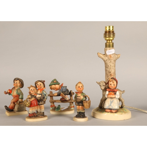 280 - M J Hummel lamp with a girl seated and four other Hummel figures (5)