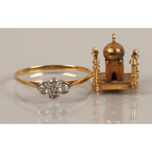 40 - 9k gold Middle Eastern temple charm and illegibly marked yellow metal ring set with four white gems,... 