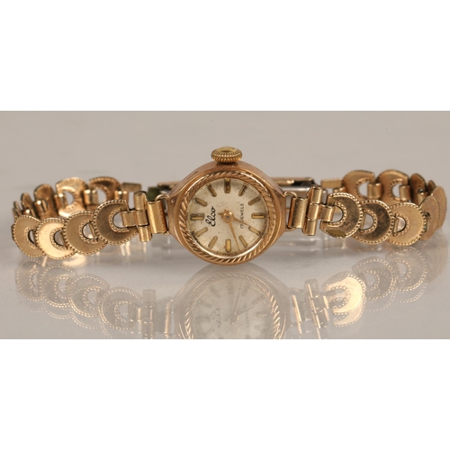 55 - Elco 9ct gold ladies wrist watch on rolled gold strap