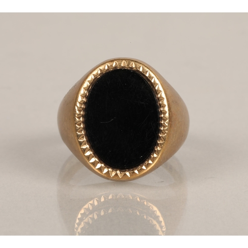 71 - 9ct gold signet ring set with black stone, ring size R, 8.3g