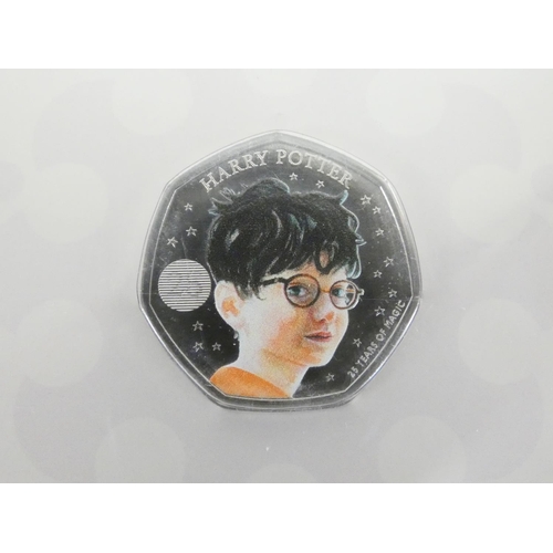 271 - United Kingdom. Royal Mint coin sets to include three carded and sealed BU Harry Potter 25 Years of ... 