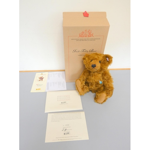 52 - Steiff. Irish Teddy Bear, 2002, white tag 660702, produced exclusively for UK and Ireland, reddish-b... 