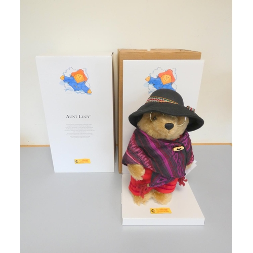 53 - Steiff. Paddington Aunt Lucy Teddy Bear, 2006, white tag 662409, in blonde mohair with shawl and gol... 