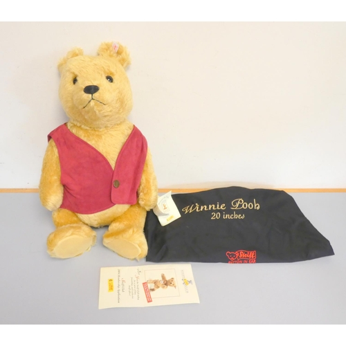 60 - Steiff. Winnie the Pooh Teddy Bear, 2004, white tag 680298, in yellow mohair with red waistcoat. Com... 