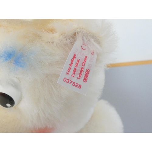 62 - Steiff. Clown Teddy Bear, 2006, white tag 037528, in white mohair with clown hat and red nose. Compl... 