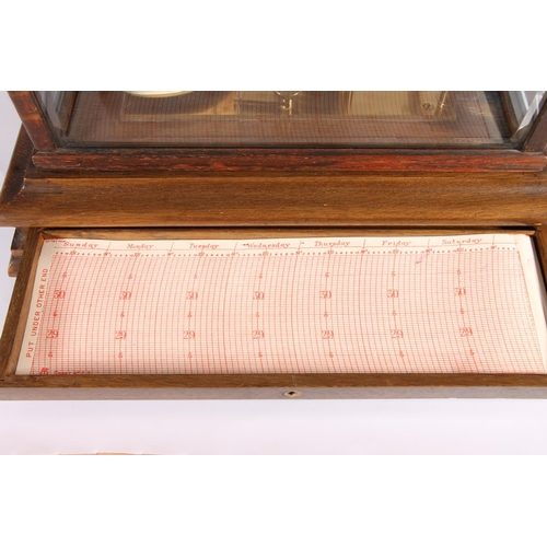 299 - Edwardian oak cased barograph, c1910, the glazed case over single drawer on bracket feet, H22cm.